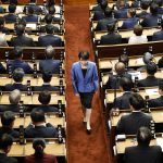 Sanae Takaichi, president of the ruling Liberal Democratic Party, walks after casting a vote in an election to choose Japan's next prime minister during a House of Representatives plenary session