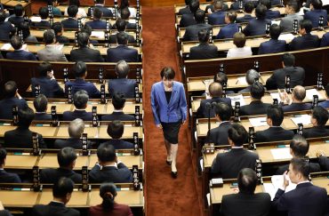 Sanae Takaichi, president of the ruling Liberal Democratic Party, walks after casting a vote in an election to choose Japan's next prime minister during a House of Representatives plenary session