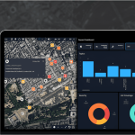 Cybersecurity analysts monitor AI-powered threat dashboards in a secure operations center after Dataminr’s acquisition.
