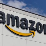 Amazon headquarters illuminated over Seattle skyline during earnings week, symbolizing the company’s resurgence and AWS’s renewed dominance in the global tech cycle.