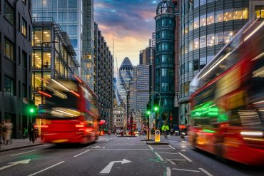 City of London skyline with financial district towers, representing Britain’s £775 billion crypto market reopening under FCA oversight.