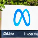 Meta headquarters in Menlo Park illuminated at dusk during earnings week, symbolizing the balance between advertising power and heavy AI investment.