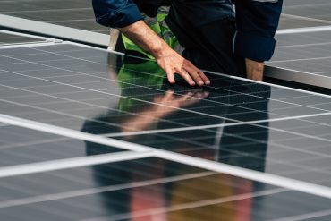 Rows of solar panels at Australia’s largest renewable energy project supporting Microsoft’s AI operations