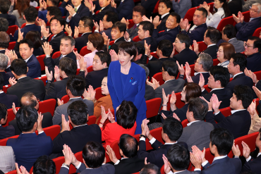 Sanae Takaichi receives the applauds from fellow lawmakers as she is elected as new Liberal Democratic Party president during the ruling Liberal Democratic Party presidential