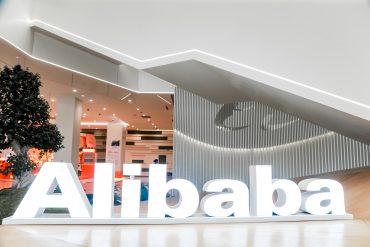 Alibaba headquarters logo seen on corporate campus during quarterly earnings announcement, as cloud expansion and AI investments reshape margins, signaling a strategic pivot toward scalable AI infrastructure.