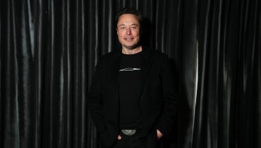 Elon Musk addresses Tesla shareholders in Austin following approval of his record $1 trillion compensation package.