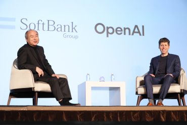 Sam Altman and Masayoshi Son on stage discussing OpenAI’s expansion and global infrastructure ambitions.