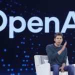 Sam Altman speaks at a technology industry event, photographed in close-up during a public appearance as OpenAI enterprise revenue sees growth