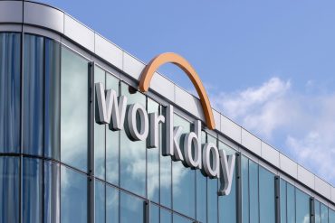 Workday headquarters building with corporate logo displayed on glass facade, as Workday reports Q3 results.