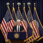 The Federal Reserve signals a cautious policy reset as inflation remains above target and economic growth stays resilient