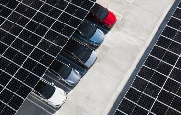 Group of Tesla electric vehicle models displayed together, as Tesla posts its first annual delivery decline in 2025 as EV demand slows and the company pivots toward energy storage and autonomous systems.