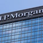 JP Morgan Chase headquarters building featuring the company’s logo and exterior signage. JP Morgan posts strong Q4 results on trading gains and asset inflows, while higher credit reserves and rising expenses signal pressure into 2026.