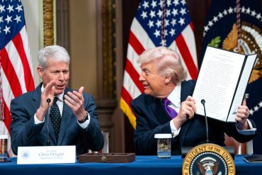 President Donald Trump and Energy Secretary Chris Wright presenting the Ratepayer Protection Pledge on AI data center energy infrastructure at the White House