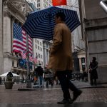 New York Stock Exchange building as U.S. payrolls fall by 92,000 in February, signaling labor market weakness.