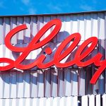 Eli Lilly headquarters as Lilly Insilico deal advances AI drug discovery and pharmaceutical AI strategy