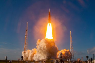 Boeing Space Launch System for Artemis II mission during test flight, highlighting Boeing defense and aerospace capabilities