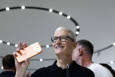 Tim Cook unveils iPhone 17 at Apple event as Apple 50 years reflects platform strategy, services revenue growth, and ecosystem scale driving long-term growth