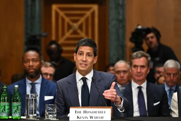 Kevin Warsh during his Senate confirmation hearing as lawmakers examine his Fed nomination, inflation focus, and views on Federal Reserve independence
