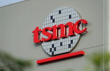 TSMC AI chip revenue Q1 2026 strong AI chip demand CoWoS packaging constraints advanced node growth semiconductor leadership TSMC AI infrastructure expansion