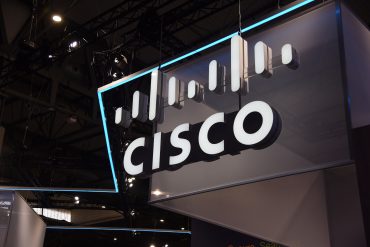 Cisco branding displayed during Cisco earnings 2026 as AI infrastructure orders, networking demand, enterprise AI upgrades, and hyperscale AI infrastructure spending accelerate globally.