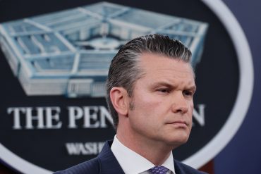 Pete Hegseth speaking in a US defense context, illustrating Pentagon AI partnerships and military AI strategy as classified AI networks expand through government AI contracts and accelerate defense technology integration