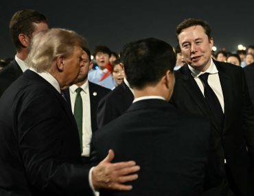 Donald Trump introducing Elon Musk during Beijing summit representing Tesla China operations, U.S.-China diplomacy, and technology trade negotiations
