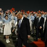 Donald Trump arriving in Beijing representing Trump Beijing summit, U.S.-China trade talks, semiconductor export controls, and bilateral economic relations