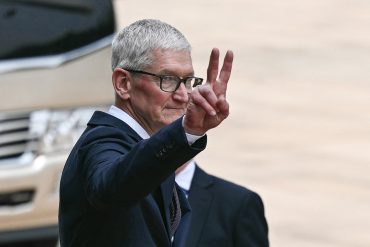 Apple CEO Tim Cook attends the Beijing summit during U.S.-China trade talks as Apple supply chains, China revenue exposure, and semiconductor negotiations remain under scrutiny.