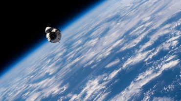 SpaceX Crew Dragon Endeavor in orbit during SpaceX’s historic IPO process as Starlink revenue, orbital AI infrastructure, and reusable launch systems drive growth.