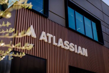 Atlassian office illustrating Atlassian Q3 2026 results with strong Atlassian cloud revenue growth, enterprise software growth and expanding Atlassian AI platform adoption across global enterprise customers