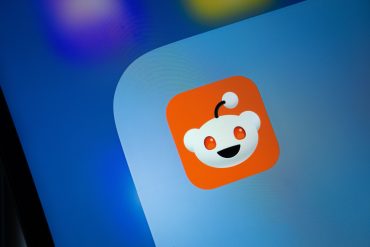 Reddit platform interface illustrating Reddit Q1 2026 results with strong revenue growth, rising DAU, expanding advertising revenue, and increasing profitability as AI monetization and platform strategy drive long-term engagement and user growth