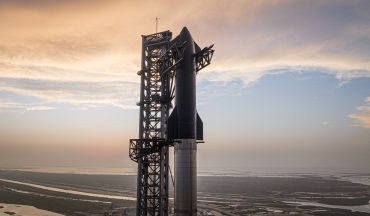 SpaceX Starship launching during a test flight, illustrating SpaceX Q2 earnings, revenue growth, Starlink expansion, AI spending, capital investment, SpaceX financial results and the company's long-term space strategy.