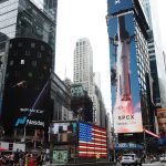 SpaceX signage displayed at Nasdaq MarketSite during the company’s record $75 billion IPO and public market debut in New York.