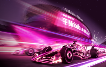 T-Mobile Q2 earnings illustrated by Formula 1 racing past T-Mobile Arena in Las Vegas, representing T-Mobile service revenue, subscriber growth and wireless communications.