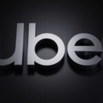Uber logo representing the Uber Delivery Hero acquisition, Uber Eats expansion and the global food delivery market.