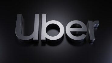 Uber logo representing the Uber Delivery Hero acquisition, Uber Eats expansion and the global food delivery market.