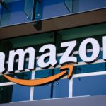 Amazon office building representing Amazon AWS growth, AI investment strategy, cloud business expansion, Anthropic gains, and rising infrastructure costs affecting cash flow.