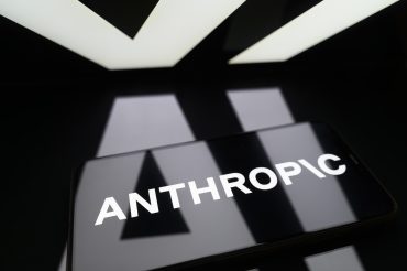 Anthropic logo on a smartphone illustrating the Anthropic export ban, Claude Fable 5, Mythos 5, AI governance, export controls, AI regulation, Frontier AI and Commerce Department oversight.