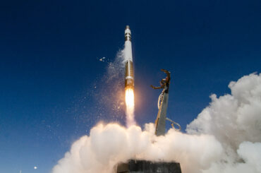 Rocket Lab Electron rocket launching into space during a Rocket Lab Electron mission, illustrating the company's growing launch business, record backlog, and expansion of its space infrastructure portfolio.