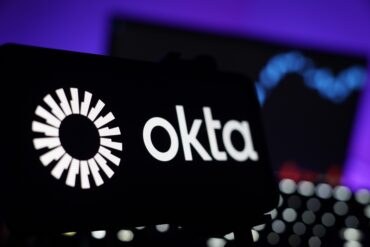 Okta logo representing the identity security company as Okta Q2 earnings show accelerating backlog, stronger profit growth and an expanding AI agent security business