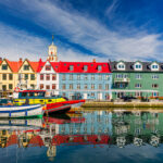 Colorful houses in Tórshavn, Faroe Islands, representing global travel destinations, AI-driven savings, Booking Holdings travel experiences, online tourism platforms, vacation planning and growing demand for unique destinations around the world.