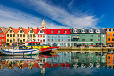 Colorful houses in Tórshavn, Faroe Islands, representing global travel destinations, AI-driven savings, Booking Holdings travel experiences, online tourism platforms, vacation planning and growing demand for unique destinations around the world.