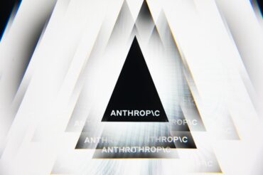 Claude displayed on a mobile phone as Anthropic's $35 billion Nvidia cloud deal with Lambda expands Claude AI infrastructure, cloud computing and AI compute capacity