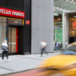 Wells Fargo branch representing Wells Fargo Q3 earnings, rising profit, loan and deposit growth, weaker trading revenue, net interest margin pressure and lower capital flexibility