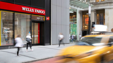 Wells Fargo branch representing Wells Fargo Q3 earnings, rising profit, loan and deposit growth, weaker trading revenue, net interest margin pressure and lower capital flexibility