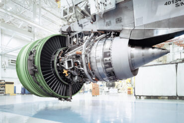 Aircraft engine turbine on a GE Aerospace factory floor, representing GE Aerospace Q3 earnings, commercial engine production, LEAP demand and aerospace manufacturing growth