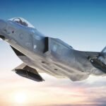 Lockheed Martin F-35 Lightning II in flight, representing Lockheed Martin Q3 earnings, F-35 production, Lot 20 funding, defense backlog and military aviation
