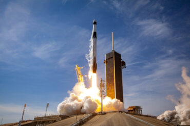 SpaceX rocket launching from the pad, representing SpaceX GPU debt, $40 billion AI financing, Starlink cash flow, capital spending and technology infrastructure
