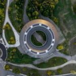 Novartis Pavilion in Basel, Switzerland, representing Novartis Q3 earnings, higher profit guidance, pharmaceutical growth, Avidity impairment and drug pipeline investment