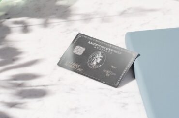 American Express Platinum Card representing American Express Q3 earnings, rising membership fees, premium card growth, travel benefits and the company’s 2026 profit outlook